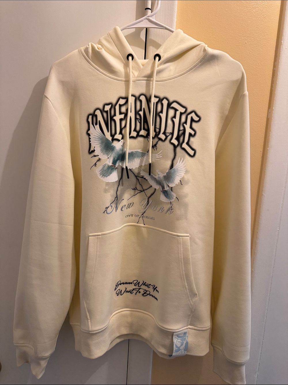 Cream Graphic Crewneck Hoodie with Dove Motif